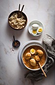 Egg curry in small bowls (India)