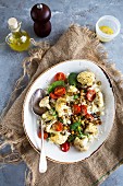 Mediterranean chickpea and cauliflower salad with tomatoes