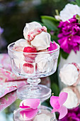 Rose water and raspberry meringue kisses