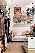 Mirrored chest of drawers in the dressing room with sofa