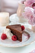 Gluten-free chocolate cake with raspberries