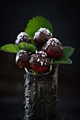 Chocolate-coated strawberries on sticks