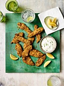 Crumbed chicken tenderloins with a chive dip