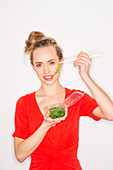 Woman eating edible seaweed