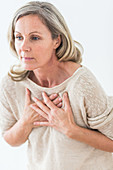 Woman suffering from a mild heart attack
