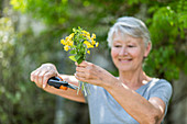 Woman picking flowers