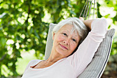 Woman resting in a hammock