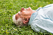 Man lying on lawn
