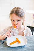 Girl eating surimi