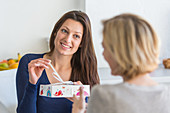 Woman receiving a gift