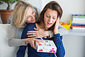 Woman receiving a gift