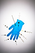 Glove and syringes