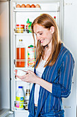 Woman checking nutrition facts
