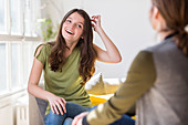 Woman talking with a teenager