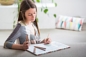 Woman colouring a mandala