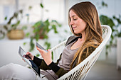 Woman using tablet and smartphone