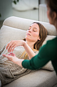 Young woman undergoing ericksonian hypnosis