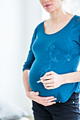 Pregnant woman smoking a cigarette