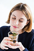 Woman drinking a thyme tea