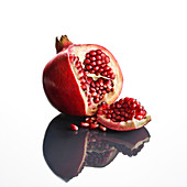 Pomegranate against white background
