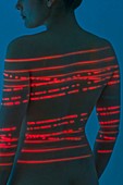 Woman with red lights on back