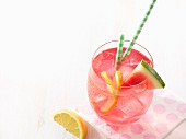 Glass of Watermelon Lemonade Over Ice, Watermelon Slice