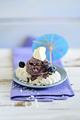 Meringues with blueberry ice cream