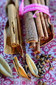 Cinnamon sticks and various spices
