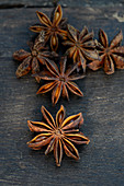 Star anise on wooden background