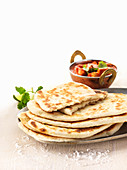 A stack of naan breads (India)