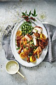 Barbecued zaatar chicken and lemon with tahini sauce