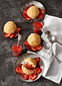 Strawberry dumplings with strawberry purée and sliced strawberries