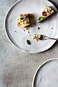 Two pieces of raw lemon and basil tart