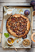 Fig and vanilla cream cheese galette with walnuts and honey