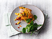 Carrot tortilla with parsley and chorizo
