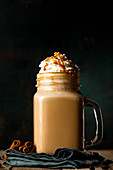 A caramel latte with cream