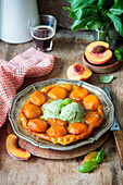 Peach tarte tatin with basil ice cream