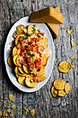 Tortilla chips with cheese and tomato salsa (Mexico)