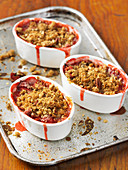Strawberry and rhubarb crumble with pecan nuts