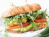 Falafel and guacamole sandwiches with rocket