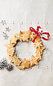 A wreath of gingerbread with a red ribbon for Christmas