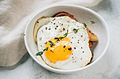 A fried egg on potato hash