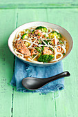 Miso soup with udon, salmon and broccoli