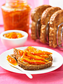 Orange marmalade on wheat toast