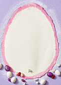 Weisser, eiförmiger Hintergrund, am Rand Zuckereier