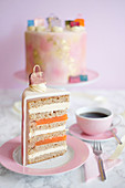 Walnut and peach layer cake, decorated with handbags