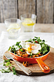 Poached eggs with spicy lentils