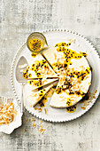 Coconut cheesecake with lime and passionfruit sauce