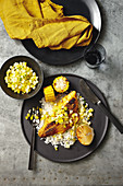 Spiced snapper with barbecued corn and pineapple salsa