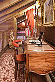 Classic desk in hallway with opulent accessores